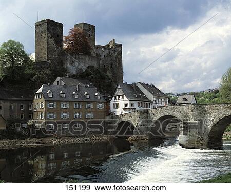 Stock Photo - Bridge across river leading to castle, Hessen, Germany . Fotosearch