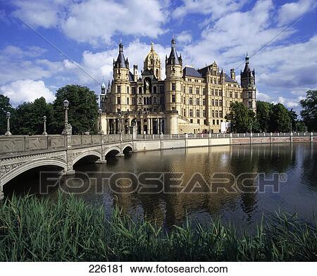 Bridge across river leading to building, Schwerin, Mecklenburg Western-Pomerania, Germany View Large Photo Image Stock Image - Bridge across river leading to building, Schwerin, Mecklenburg Western-Pomerania, Germany . Fotosearch