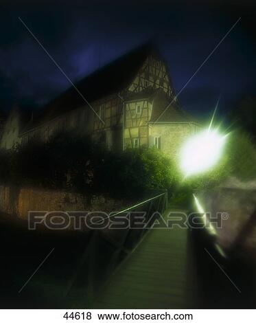Stock Photo - Bridge leading to timberframed house, Michelstadt, Hessen, Germany . Fotosearch
