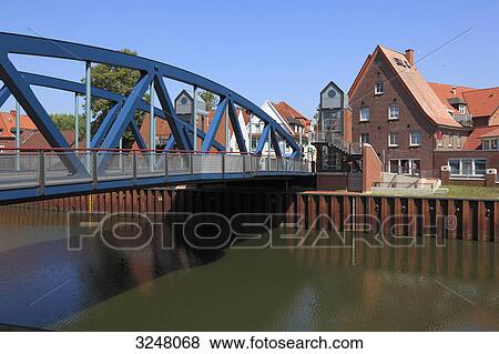 Bridge over a river in Meppen, Germany View Large Photo Image Stock Photo - Bridge over a river in Meppen, Germany . Fotosearch