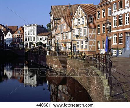 Stock Image - Buildings along canal in town . Fotosearch