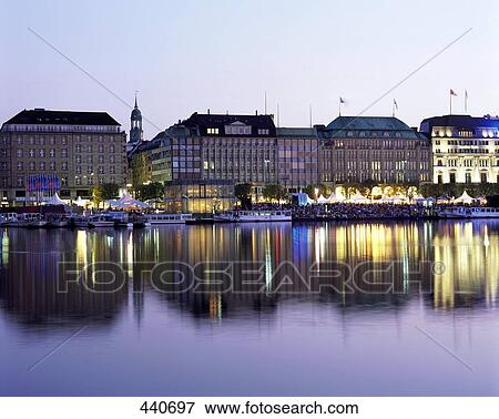 Stock Photo - Buildings at waterfront, Binnenalster Lake, Germany . Fotosearch
