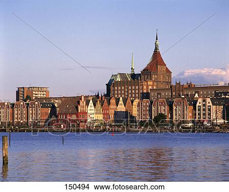 Picture - Buildings at waterfront, Rostock, Germany . Fotosearch