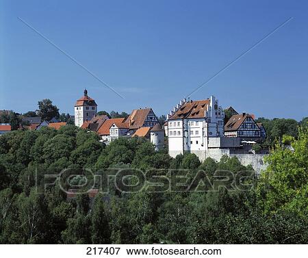 Stock Photo - Buildings in town surrounded by trees, Baden-Wurttemberg, Germany . Fotosearch