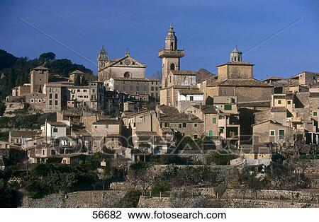 Stock Image - Buildings on hill, Valldemosa, Majorca, Balearic Islands, Spain . Fotosearch