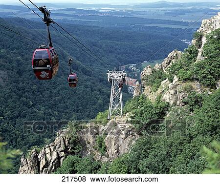 Cable car above rugged mountains, Saxony-Anhalt, Germany View Large Photo Image Stock Photo - Cable car above rugged mountains, Saxony-Anhalt, Germany . Fotosearch