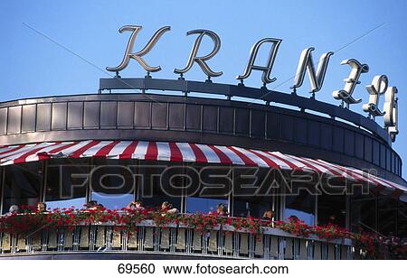 Cafe building against blue sky, Kurfurstendamm, Berlin, Germany View Large Photo Image Stock Image - Cafe building against blue sky, Kurfurstendamm, Berlin, Germany . Fotosearch