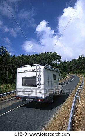 Camper on country road, Biscarosse, France View Large Photo Image Stock Photo - Camper on country road, Biscarosse, France . Fotosearch