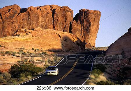Car on road, Valley of Fire State Park, Nevada, USA View Large Photo Image Stock Photograph - Car on road, Valley of Fire State Park, Nevada, USA . Fotosearch
