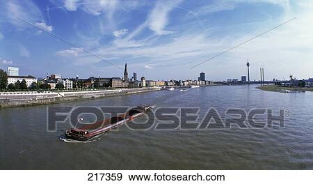 Cargo ship in river View Large Photo Image Stock Photo - Cargo ship in river . Fotosearch