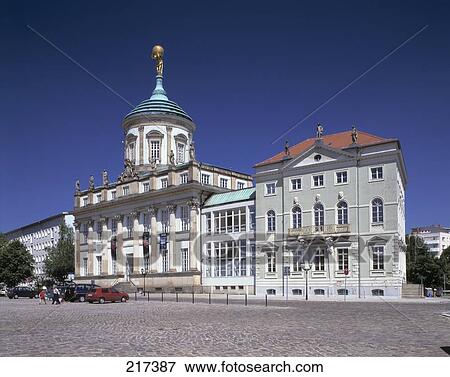 Stock Photo - Cars parked in front of buildings in row, Brandenburg, Germany . Fotosearch