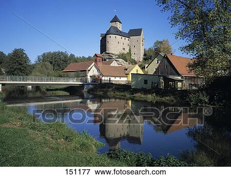 Castle and houses reflected in river, Upper Palatinate, Bavaria, Germany View Large Photo Image Stock Photo - Castle and houses reflected in river, Upper Palatinate, Bavaria, Germany . Fotosearch