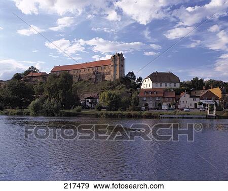 Stock Photo - Castle at riverside, Wettin Castle, Wettin, Saale River, Saxony-Anhalt, Germany . Fotosearch