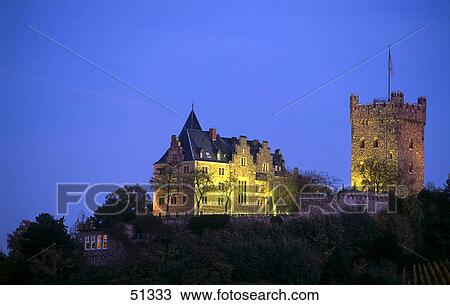 Stock Image - Castle lit up at dusk, Klopp Castle, Bingen, Germany . Fotosearch