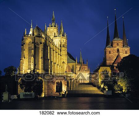 Stock Image - Cathedral lit up at night, Erfurt cathedral and St. Severi church, Thuringia, Germany . Fotosearch
