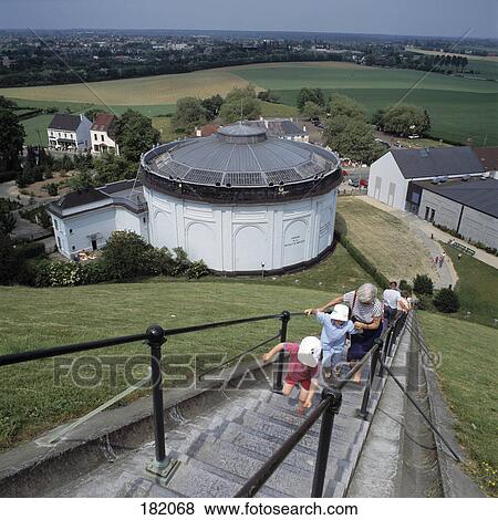 Children with woman climbing up stairs of monument, Butte du Lion, Waterloo, Belgium View Large Photo Image Stock Photo - Children with woman climbing up stairs of monument, Butte du Lion, Waterloo, Belgium . Fotosearch