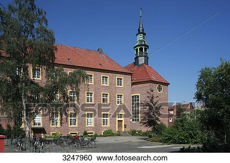 Stock Image - Church and school in Meppen, Germany . Fotosearch