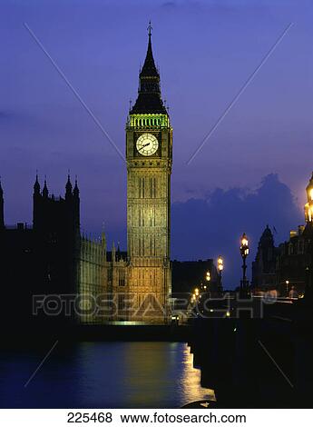 Clock tower lit up at waterfront, Big Ben, London, England View Large Photo Image Stock Photo - Clock tower lit up at waterfront, Big Ben, London, England . Fotosearch