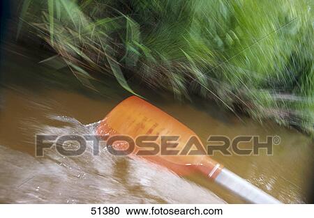 Close-up of oar above water View Large Photo Image Stock Image - Close-up of oar above water . Fotosearch