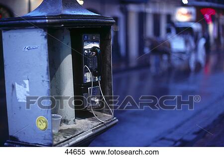 Stock Photography - Close-up of public phone at roadside, French Quarter, Bourbon Street, New Orleans, Louisiana, USA . Fotosearch