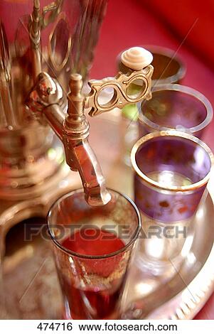 Close-up of samovar and glasses on tray View Large Photo Image Stock Photograph - Close-up of samovar and glasses on tray . Fotosearch
