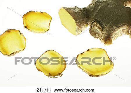Stock Image - Close-up of slices of ginger . Fotosearch