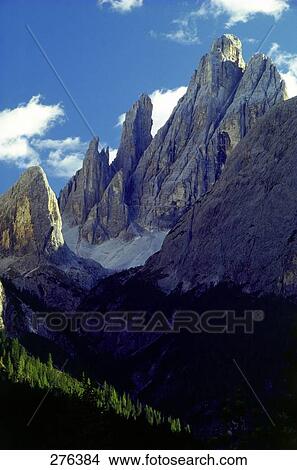 Picture - Clouds over mountains, Zwoelferkofel, Fischlein Valley, Dolomites, South Tyrol, Italy . Fotosearch