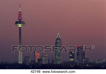 Communication tower and skyscrapers in city at dawn, Messeturm, Frankfurt, Germany View Large Photo Image Stock Photo - Communication tower and skyscrapers in city at dawn, Messeturm, Frankfurt, Germany . Fotosearch
