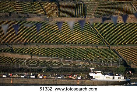 Stock Image - Container ship in river, Rhine River, Germany . Fotosearch