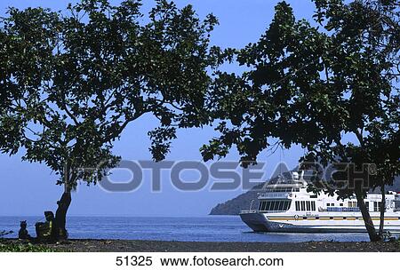 Stock Photography - Cruise ship at coast, Sumbawa Island, Indonesia . Fotosearch