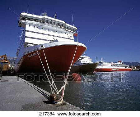Cruise ship moored at port, Peloponnesus, Greece View Large Photo Image Picture - Cruise ship moored at port, Peloponnesus, Greece . Fotosearch