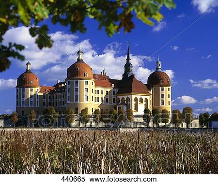 Stock Photography - Cultivated field in front of castle, Moritzburg Castle, Dresden, Saxony, Germany . Fotosearch