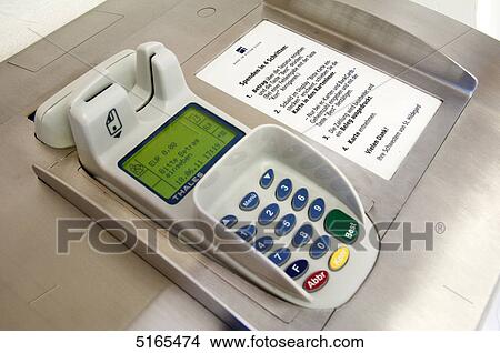 Picture - Donation machine in a church . Fotosearch
