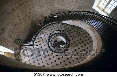 Stock Photo - Empty spiral staircase in lighthouse, France . Fotosearch