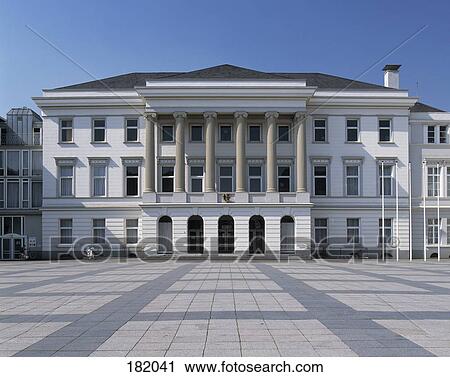 Stock Image - Facade of building against blue sky, Duesseldorf, Germany . Fotosearch