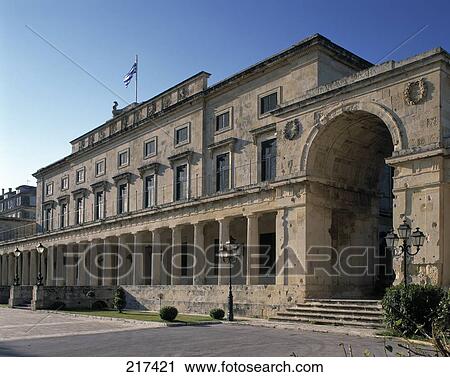 Stock Image - Facade of building under clear blue sky . Fotosearch