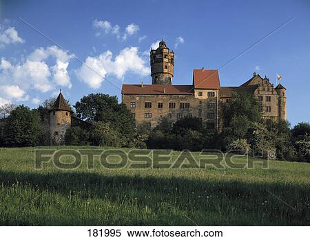 Stock Photography - Field in front of cathedral, Ronneburg Castle, Hesse, Germany . Fotosearch