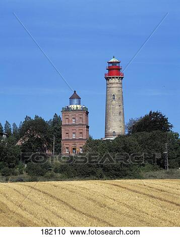 Field with lighthouse in background, Mecklenburg-Western Pomerania, Germany View Large Photo Image Stock Image - Field with lighthouse in background, Mecklenburg-Western Pomerania, Germany . Fotosearch