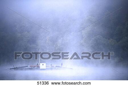 Stock Photograph - Fog over river, River Neckar, Heidelberg, Germany . Fotosearch