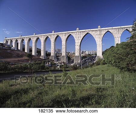 Freewater aqueduct against blue sky, Lisbon, Portugal View Large Photo Image Stock Photography - Freewater aqueduct against blue sky, Lisbon, Portugal . Fotosearch