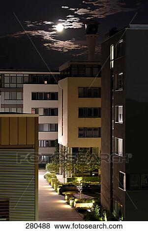 Full moon over city View Large Photo Image Stock Photo - Full moon over city . Fotosearch