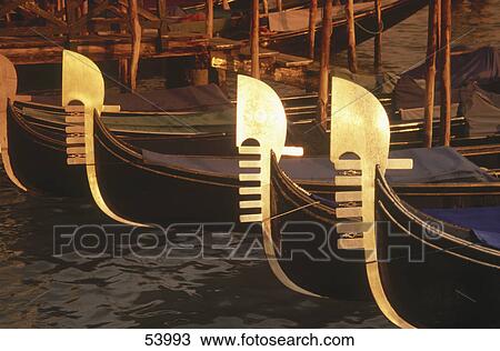 Gondola boats in canal, Venice, Italy View Large Photo Image Stock Image - Gondola boats in canal, Venice, Italy . Fotosearch