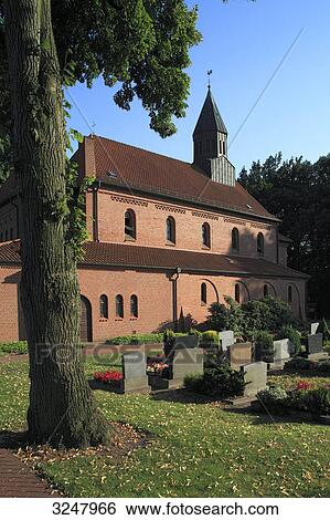 Gravestones on a graveyard in front of a church, Laehden, Germany View Large Photo Image Stock Photograph - Gravestones on a graveyard in front of a church, Laehden, Germany . Fotosearch