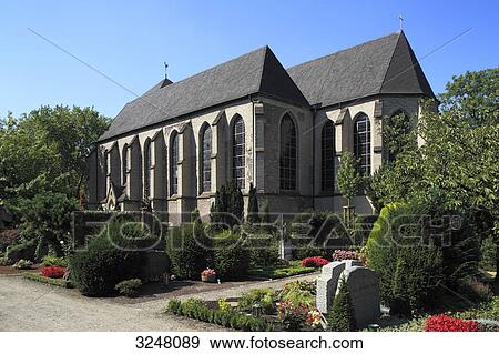 Stock Photo - Graveyard beside Saint Johann Baptist church, Duisburg, Germany . Fotosearch