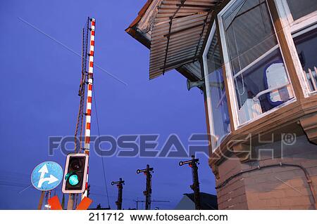 Green traffic light on railroad crossing signal, Germany View Large Photo Image Stock Image - Green traffic light on railroad crossing signal, Germany . Fotosearch