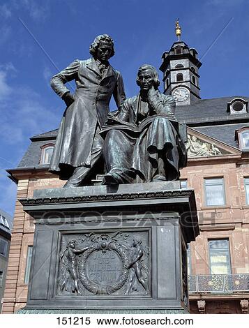 Stock Photography - Grimm brothers statues in front of city hall, Hanau, Hesse, Germany . Fotosearch