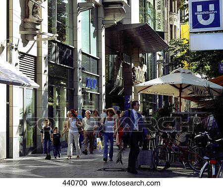 Group of people walking in street View Large Photo Image Stock Image - Group of people walking in street . Fotosearch