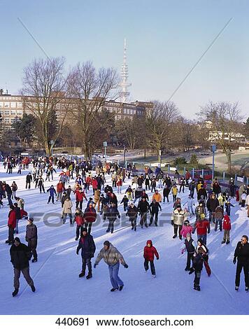 Group of tourists ice-skating, Germany View Large Photo Image Stock Image - Group of tourists ice-skating, Germany . Fotosearch