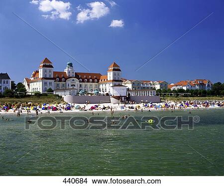Picture - Group of tourists on beach, Germany . Fotosearch