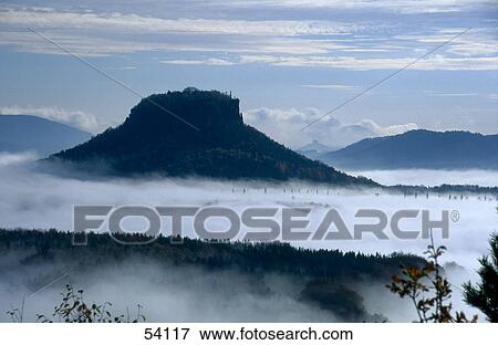 Haze covering mountains, Mt Lilienstein, Saxony, Germany View Large Photo Image Stock Photo - Haze covering mountains, Mt Lilienstein, Saxony, Germany . Fotosearch